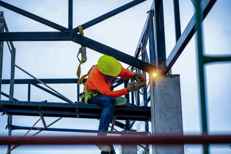 Construction,Workers,Put,On,Safety,Gear,To,Work,On,The