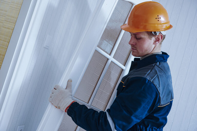 Carpenter,Worker,At,Door,Installation